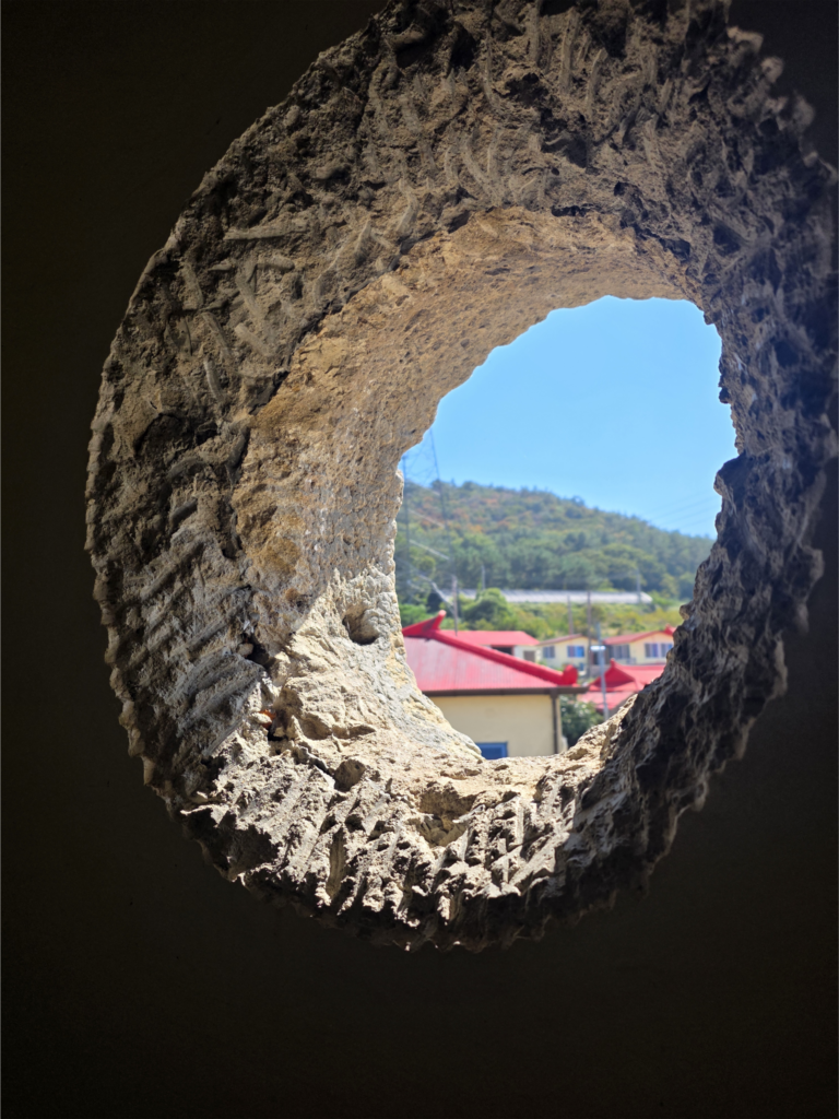Small architectural opening inside one of the 12 Apostles structures on Soakdo